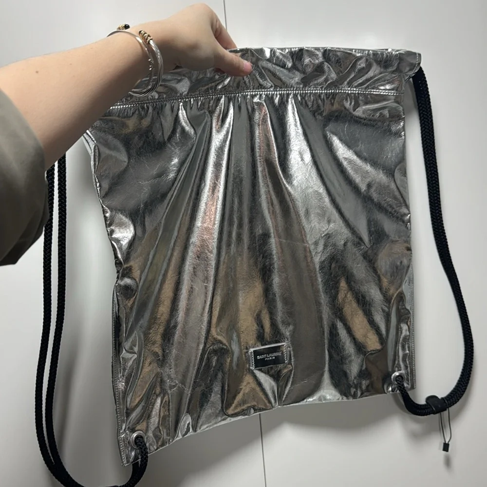 Saint Laurent Metallic Silver Drawstring Backpack